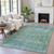 8' X 10' Teal Blue And Ivory Abstract Washable Indoor Outdoor Area Rug