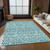 8' X 10' Teal Blue And Ivory Southwestern Washable Indoor Outdoor Area Rug