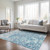 8' X 10' Teal Blue And Ivory Abstract Washable Indoor Outdoor Area Rug