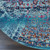 4' Blue Red And Orange Floral Distressed Round Rug