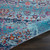 4' Blue Red And Orange Floral Distressed Round Rug