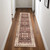 8' Red and Ivory Oriental Distressed Non Skid Runner Rug