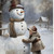 Boy Building A Snowman White Framed Wall Art