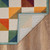 5' X 7' Orange And Ivory Indoor Outdoor Area Rug
