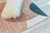 7' X 10' Beige and Green Abstract Distressed Area Rug