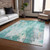 3' X 5' Teal Blue Peach And Ivory Abstract Washable Indoor Outdoor Area Rug