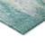 3' X 5' Teal Blue Peach And Ivory Abstract Washable Indoor Outdoor Area Rug