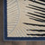 8' X 10' Navy Blue Ivory And Black Palm Leaf Indoor Outdoor Area Rug