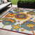 5' X 8' Ivory Blue Orange Red And Yellow Floral Indoor Outdoor Area Rug
