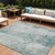 8' X 10' Turquoise And Ivory Abstract Washable Indoor Outdoor Area Rug
