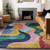 3' X 5' Green Orange And Pink Abstract Washable Indoor Outdoor Area Rug