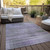 5' X 8' Purple Lavender And Gray Striped Washable Indoor Outdoor Area Rug
