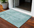 3' X 5' Teal Blue And Ivory Abstract Washable Indoor Outdoor Area Rug