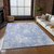 5' X 8' Sky Blue Denim Blue And Ivory Abstract Washable Indoor Outdoor Area Rug