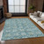 8' X 10' Teal Blue Gray And Gold Floral Washable Indoor Outdoor Area Rug