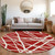 8' Red And Ivory Round Geometric Washable Indoor Outdoor Area Rug