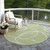 8' Artichoke Green And Ivory Round Abstract Washable Indoor Outdoor Area Rug