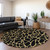 8' Black And Gold Round Geometric Washable Indoor Outdoor Area Rug