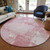 8' Pink And Ivory Round Abstract Washable Indoor Outdoor Area Rug