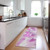 2' X 8' Pink and Ivory Abstract Washable Indoor Outdoor Runner Rug