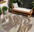 8' Brown Beige And Ivory Round Abstract Washable Indoor Outdoor Area Rug
