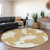 8' Gold And Ivory Round Abstract Washable Indoor Outdoor Area Rug