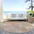 8' Coral Ivory And Peach Round Geometric Washable Indoor Outdoor Area Rug