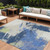10' X 14' Navy Blue Green And Ivory Abstract Washable Indoor Outdoor Area Rug