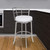 Homeroots Living Room 35" White Faux Leather and Iron Swivel Low Back Counter Height Bar Chair