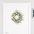 23" Green and White Artificial Spring Daisy Wreath