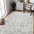 Homeroots Home Decor 6' x 9' Light Gray Floral Power Loom Area Rug With Fringe