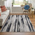 2' X 3' Black Silver and Gray Abstract Power Loom Area Rug