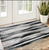 2' X 3' Black Silver and Gray Abstract Power Loom Area Rug