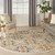 Homeroots Home Decor 8' Ivory Round Floral Power Loom Area Rug