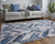 Homeroots Home Decor 8' X 10' Ivory Blue and Gray Chevron Power Loom Distressed Area Rug