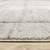 7' X 10' Grey Teal Beige and Tan Geometric Power Loom Area Rug