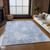 9' X 12' Sky Blue Denim Blue And Ivory Abstract Washable Indoor Outdoor Area Rug