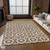 10' X 14' Chocolate Ivory And Gold Floral Medallion Washable Indoor Outdoor Area Rug