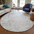 8' Gray And Ivory Round Abstract Washable Indoor Outdoor Area Rug