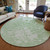 8' Mint Green And Ivory Round Abstract Washable Indoor Outdoor Area Rug