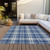 9' X 12' Navy Blue And Ivory Plaid Washable Indoor Outdoor Area Rug