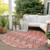 8' Pink Salmon And Blush Round Southwestern Washable Indoor Outdoor Area Rug