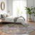 8' Purple Green And Brown Round Floral Washable Indoor Outdoor Area Rug