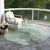 8' Green And Taupe Round Abstract Washable Indoor Outdoor Area Rug