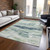 8' X 10' Mint Green Ivory And Denim Blue Abstract Washable Indoor Outdoor Area Rug