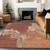8' X 10' Orange And Burnt Orange Abstract Washable Indoor Outdoor Area Rug