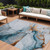 10' X 14' Sky Blue And Copper Abstract Washable Indoor Outdoor Area Rug