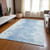 9' X 12' Sky Blue And Denim Blue Abstract Washable Indoor Outdoor Area Rug