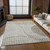 10' X 14' Taupe Beige And Ivory Striped Washable Indoor Outdoor Area Rug