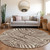 8' Brown And Beige Round Animal Print Washable Indoor Outdoor Area Rug